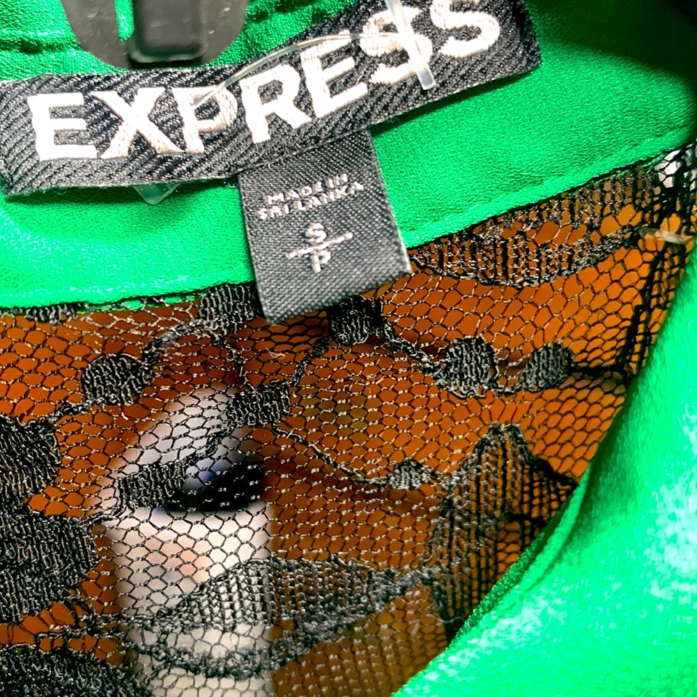 Lady’s: Small green lace shoulder sleeveless button up (worn once still new)